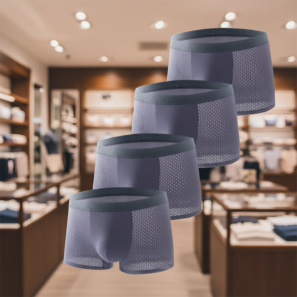 Four pairs of men's boxer briefs arranged diagonally on a plain white background. The underwear is a dark charcoal gray color with a subtle mesh texture and solid waistbands.