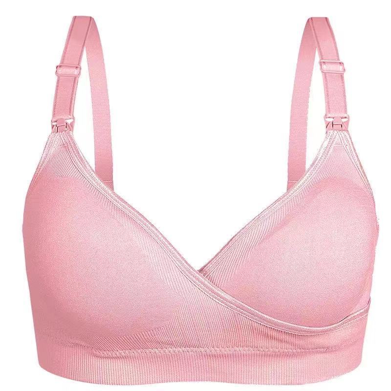 Pink bra on a white background