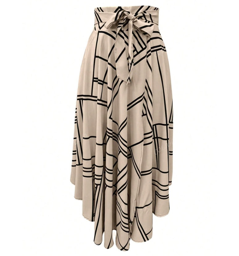 Beige skirt with black geometric pattern on a white background