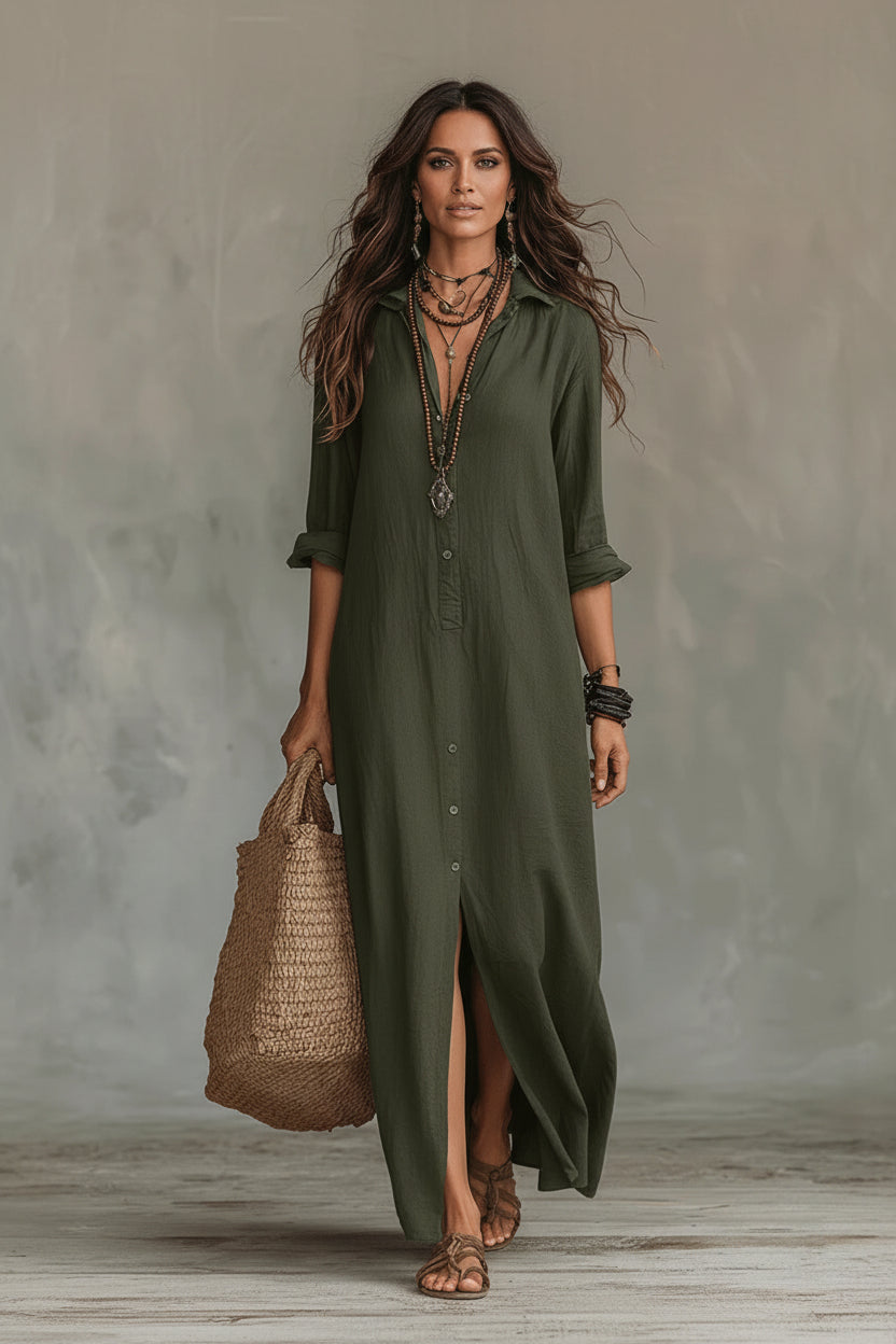 Woman wearing an olive green dress holding a woven bag against a neutral background