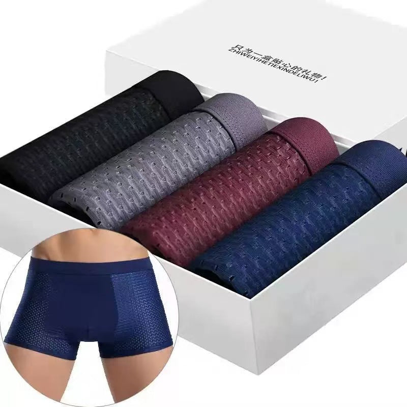 Set of men's underwear in various colors displayed in a box.