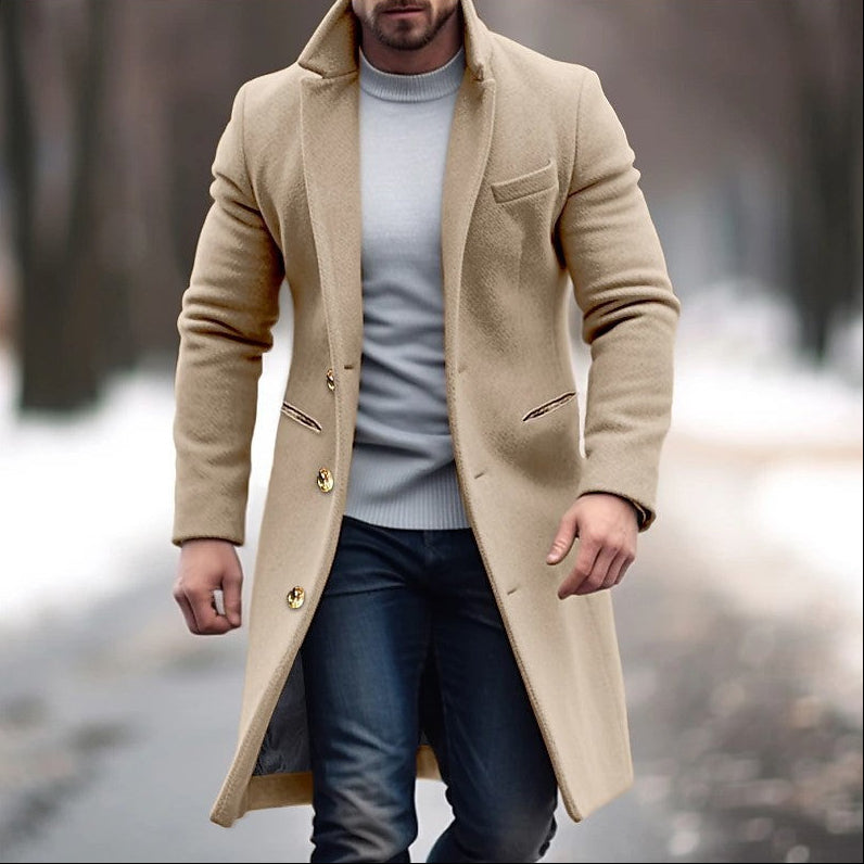 Man wearing a beige coat with a blurred background