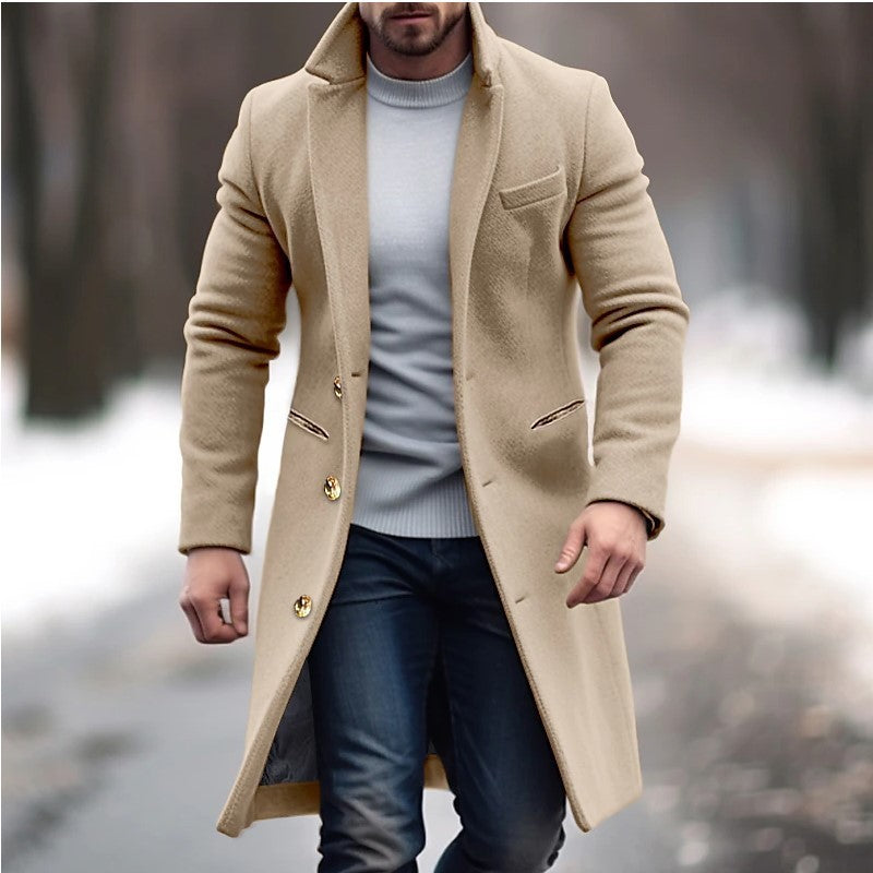 Man wearing a beige coat with a blurred background