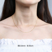 Box chain in golden color