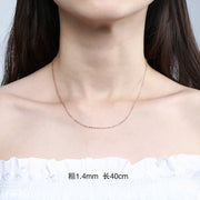 Cross chain rose gold