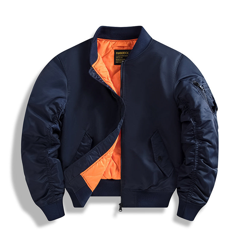 Navy bomber jacket with orange lining on a white background