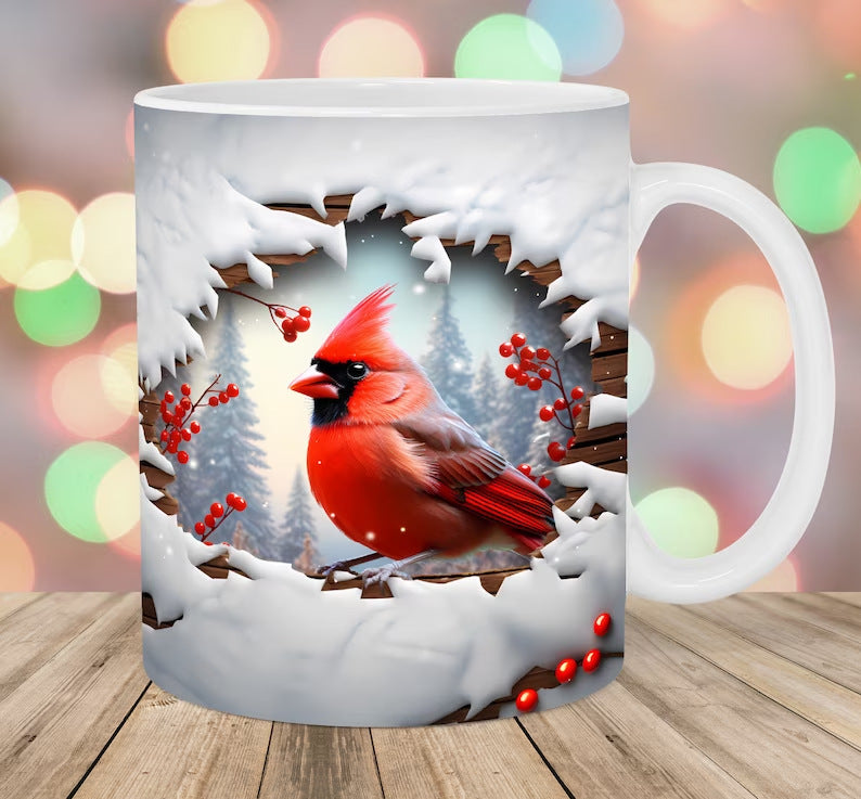 Mug with a red cardinal bird design on a wooden surface with blurred lights in the background