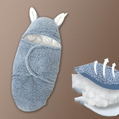Blue towel with bunny ears on a brown background