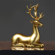Golden deer sitting